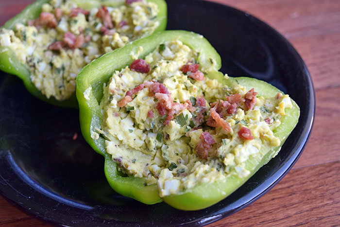 Stuffed bell pepper with egg and avocado salad