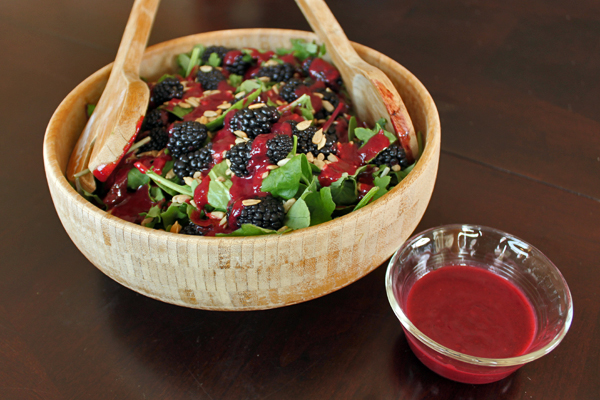 Green salad with blackberries and sunflower seeds